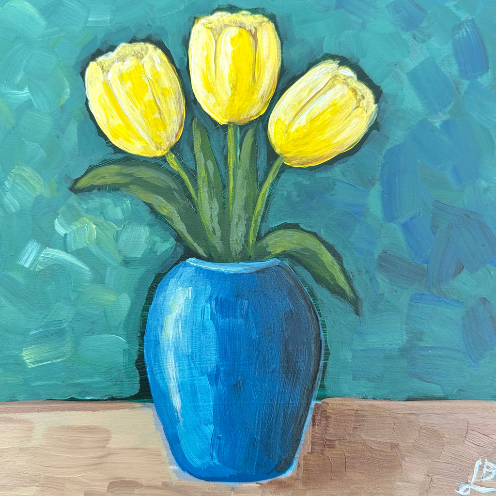 Nostalgia, three yellow tulips in a blue vase against a teal background